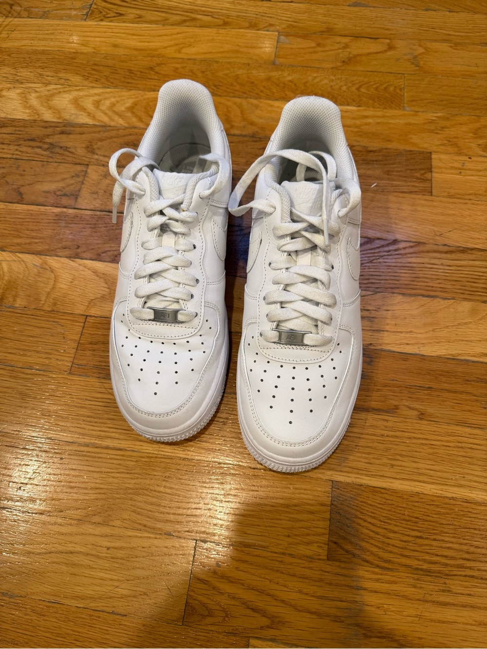 Nike Air Force Ones. White women’s size 10. Barely worn.